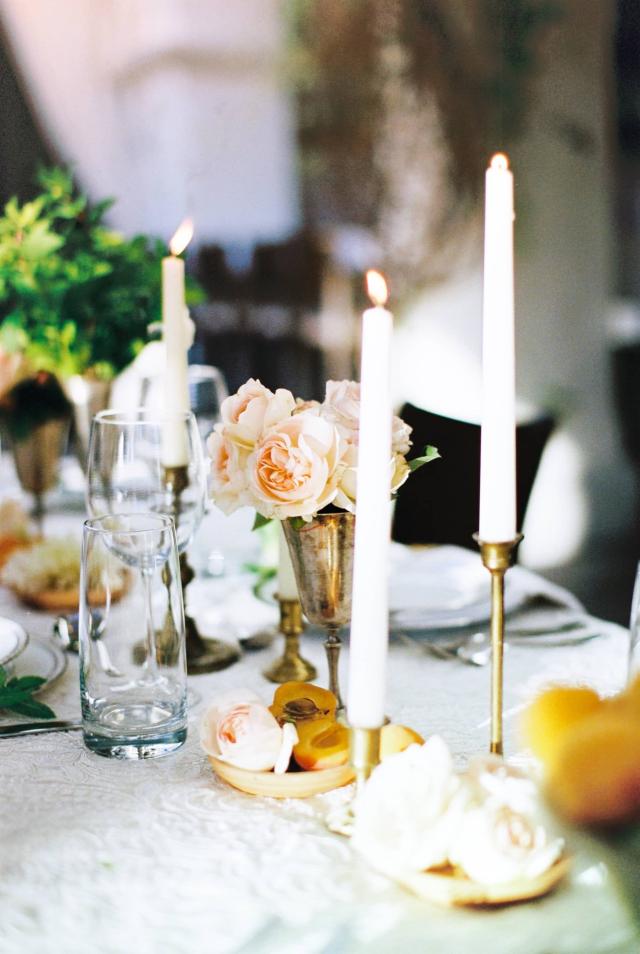 Closeup of Guest Table with Fruit, Flowers & Candles at Romantic Riviera