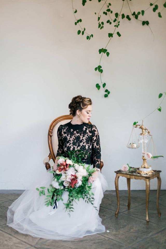 Lady Sitting on Chair with Bouquet In Hands for Spanish Nights