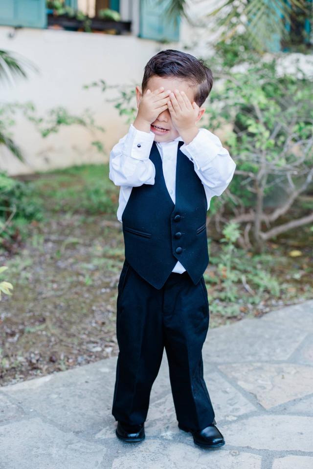 Page Boy with Hands Over His Eyes at Evelyn & Gus' Wedding
