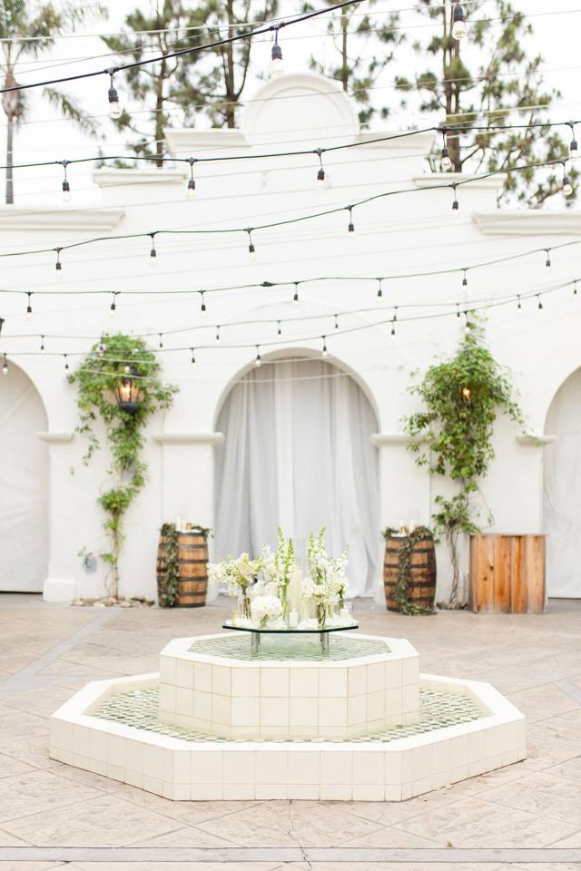 Water Fountain with Flowers on Top at Angela & Kevin's Wedding