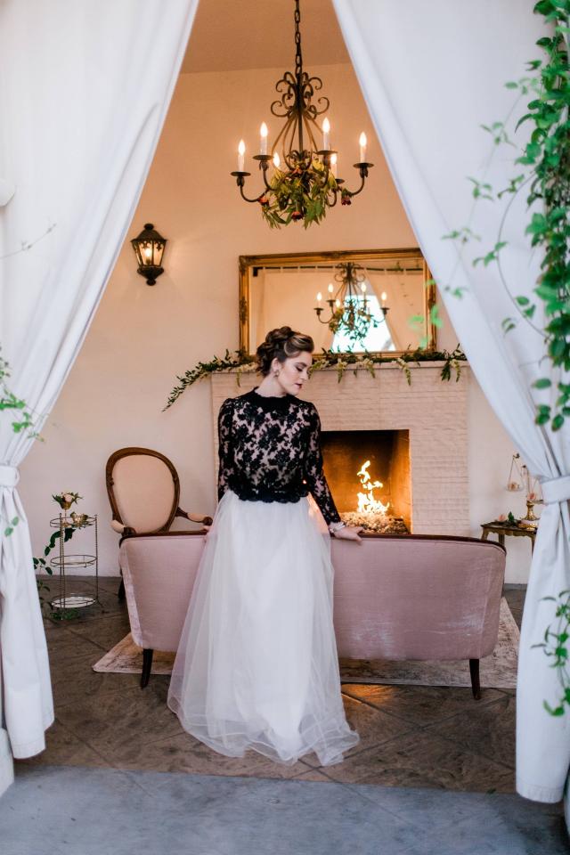 Lady in Front of Fireplace for Spanish Nights