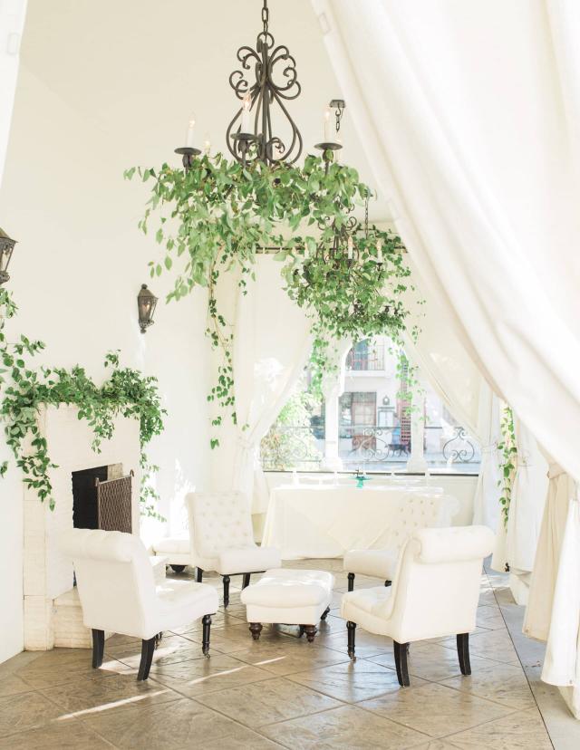 White Furniture on Patio at Evelyn & Gus' Wedding