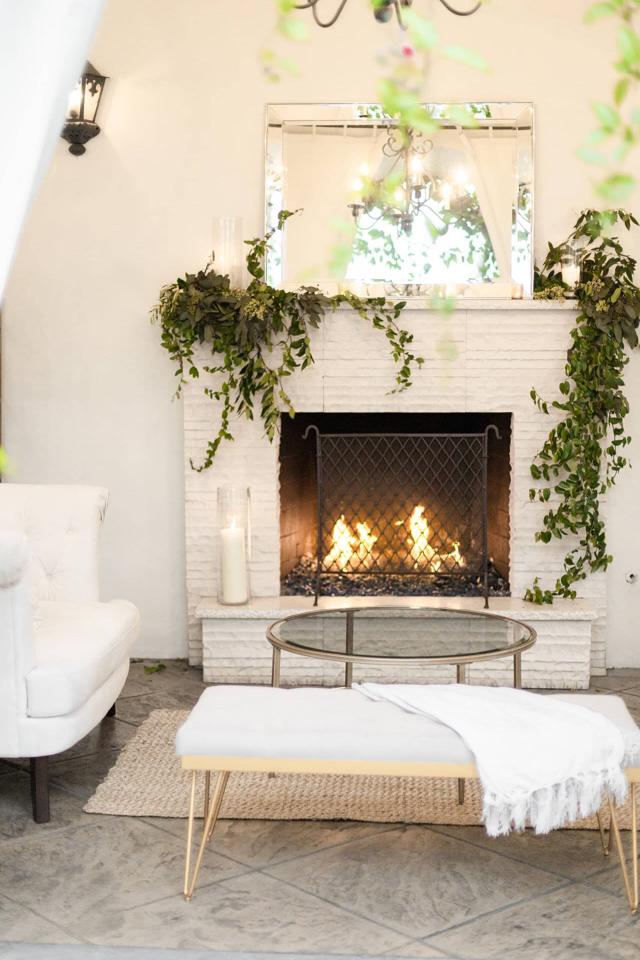 White Furniture in Front of Fireplace at Angela & Kevin's Wedding