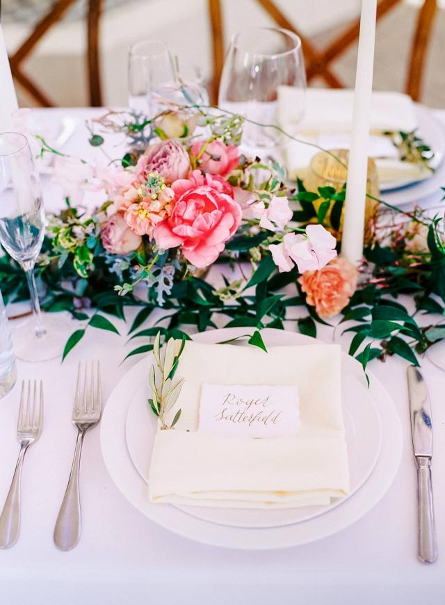 Guest Table with Flower Arrangement at Rhiannon & Joshua's Wedding