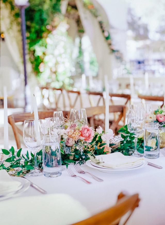 Closeup of Multiple Guest Tables with Flowers & Placemats at Rhiannon & Joshua's Wedding