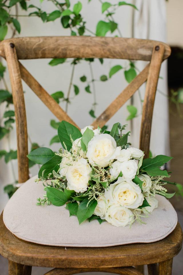 Guest Chair with Bridal Bouquet on it at Evelyn & Gus' Wedding