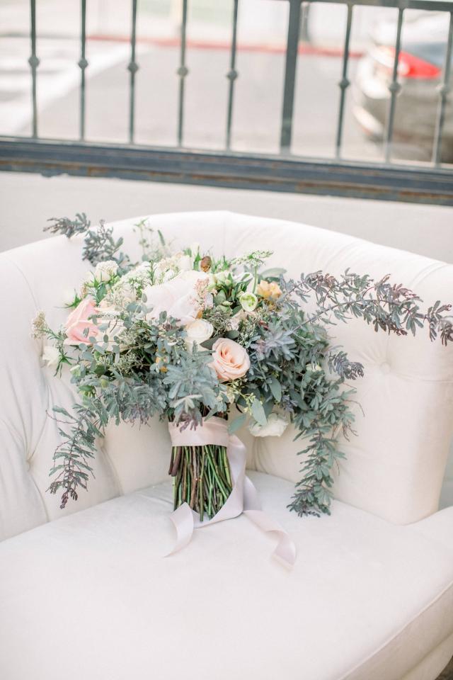 Flowers on Couch for Karen & Andy’s Wedding