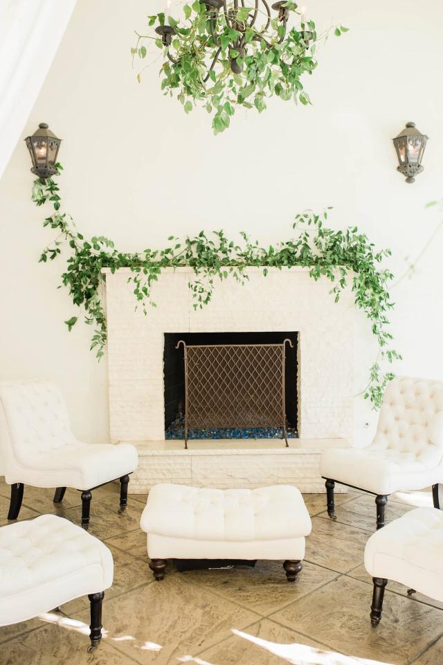 White Furniture in Front of Fireplace at Evelyn & Gus' Wedding