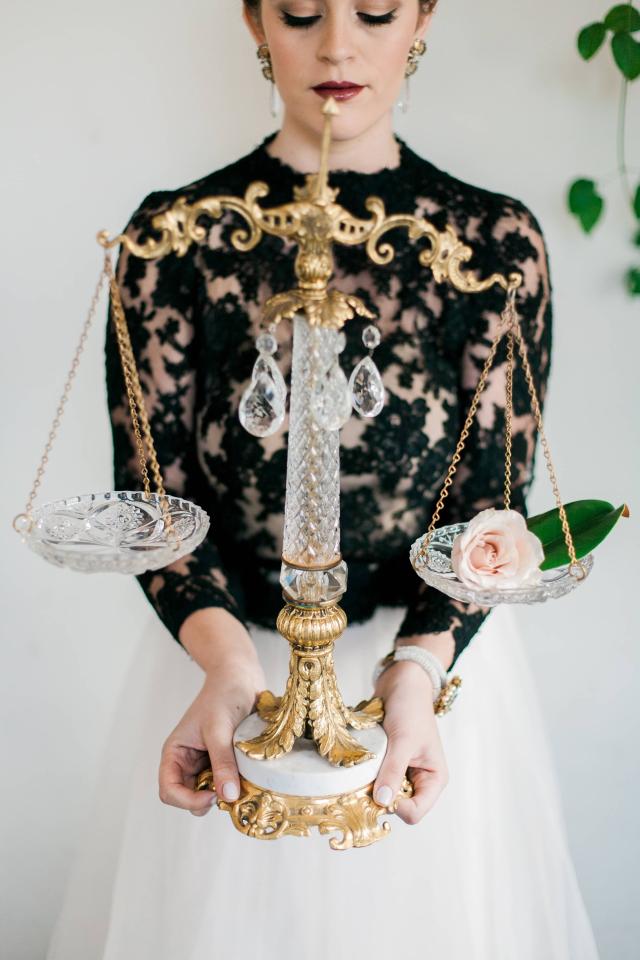 Lady Holding Crystal & Gold Scales for Spanish Nights