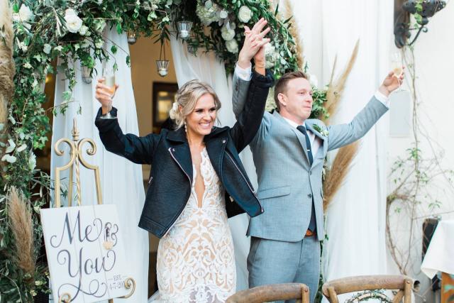 Bride & Groom Raising Their Glasses at Carly & Ben's Wedding