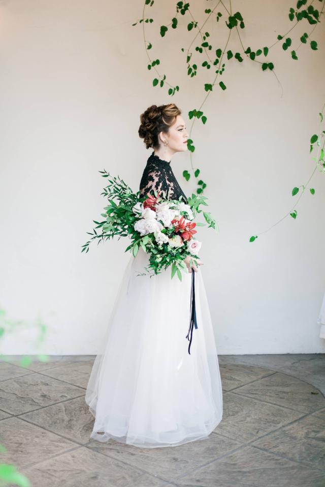 Lady Sideways Holding Flowers for Spanish Nights