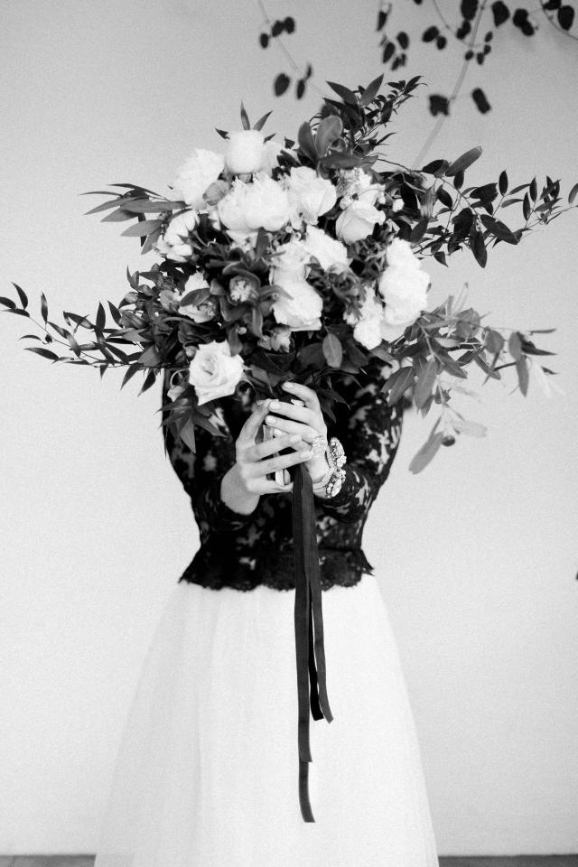 Black & White of Lady Holding Bouquet