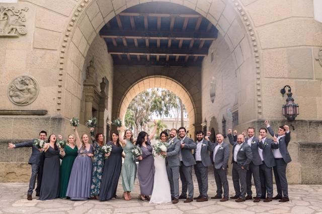 Wedding party lined up under archway for Danielle & Michael's Wedding