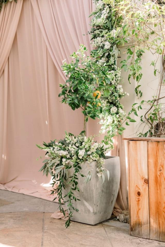 Planter pot with flower arrangement for Danielle & Michael's Wedding