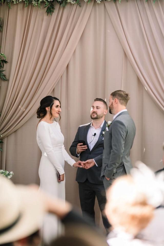 Bride and groom with wedding officiant for Danielle & Michael's Wedding