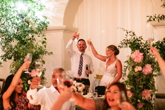 Bride and groom toasting for Danielle & Richard's Wedding