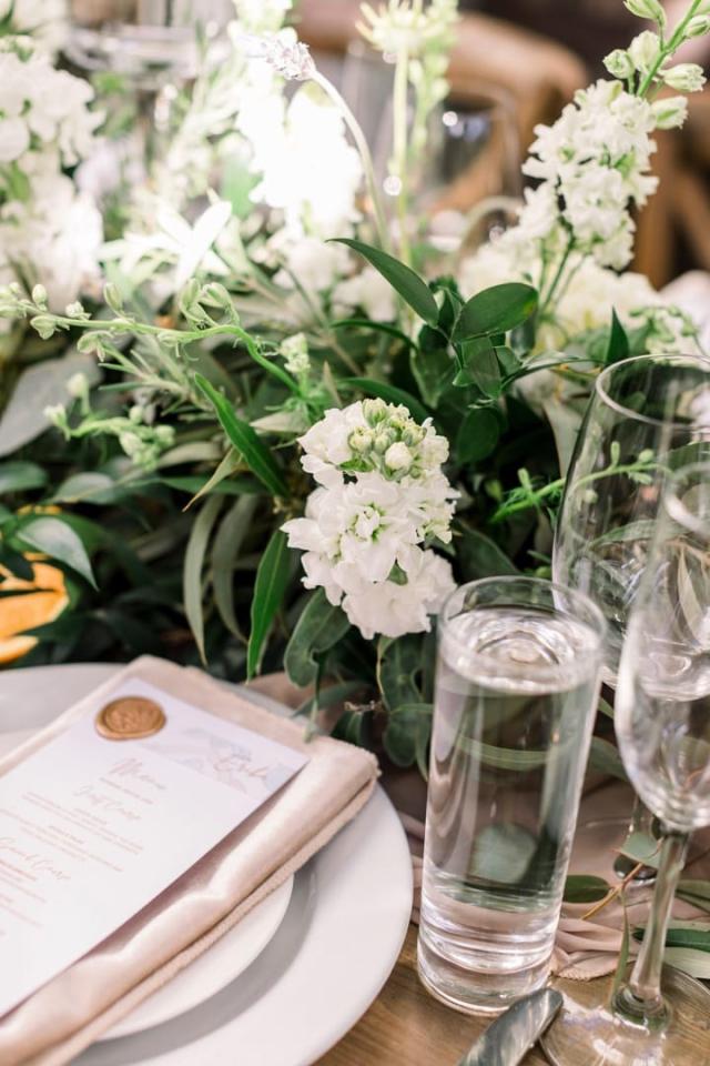 Close up of table place set and flow arrangement for Danielle & Michael's Wedding
