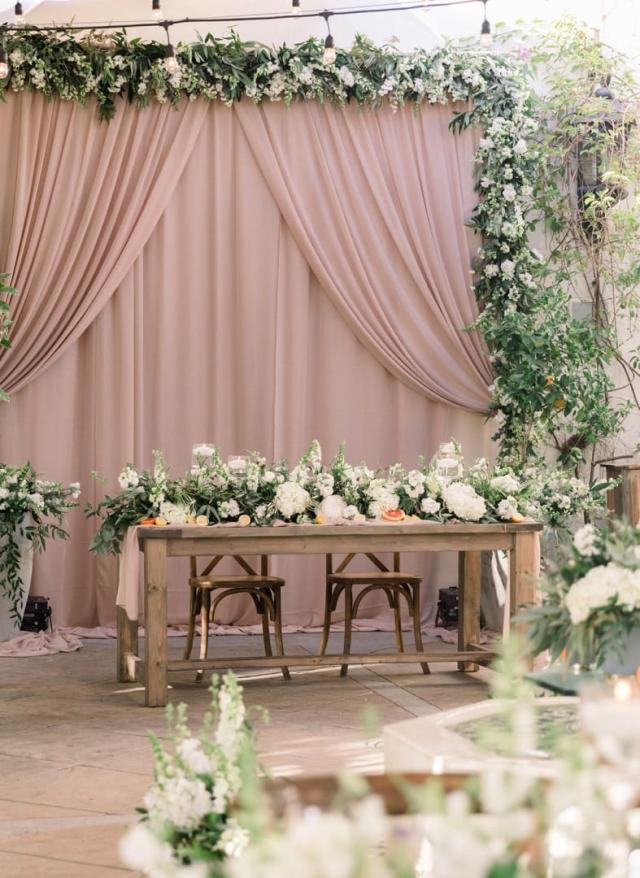Another shot of the bride and groom's table with flower arrangement for Danielle & Michael's Wedding