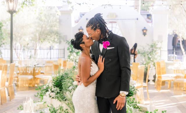 Husband and wife kissing for Daniella & Karl's Wedding