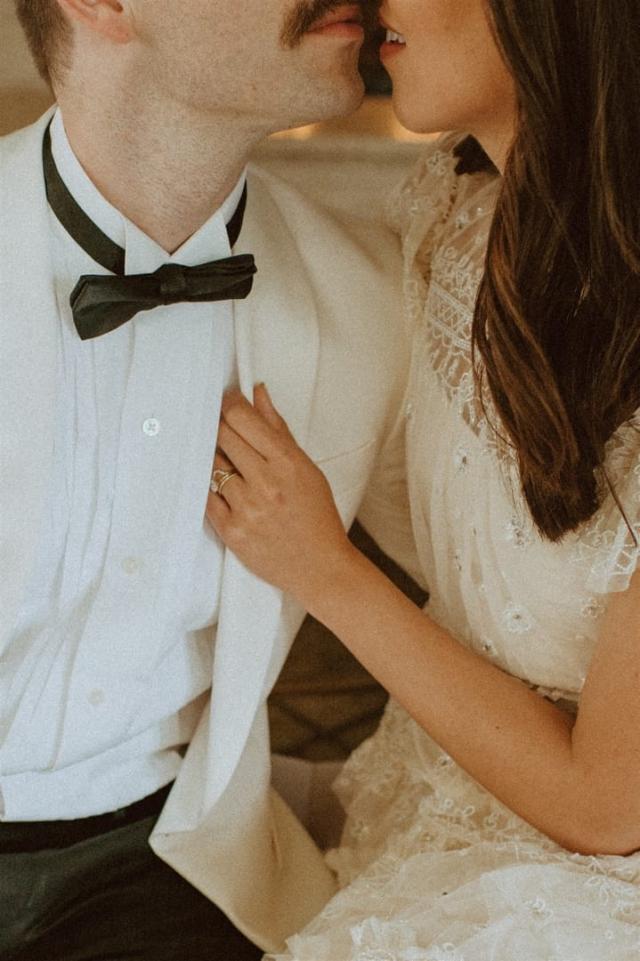 View of bride and groom nearly kissing without seeing their eyes for Paulina & Cam’s Wedding