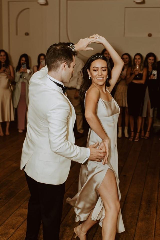 Groom twirls bride on the dance floor for Paulina & Cam’s Wedding