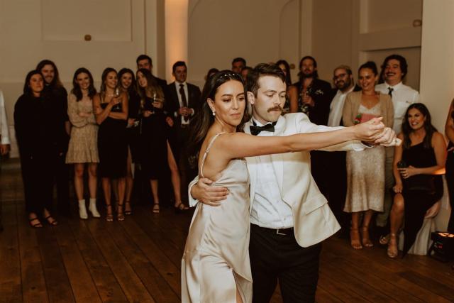 Bride and groom partner dancing in thought for Paulina & Cam’s Wedding