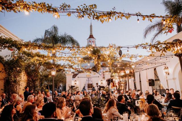 Outside shot of wedding party courtyard, with creepers and lights for Veronica & Jake’s Wedding