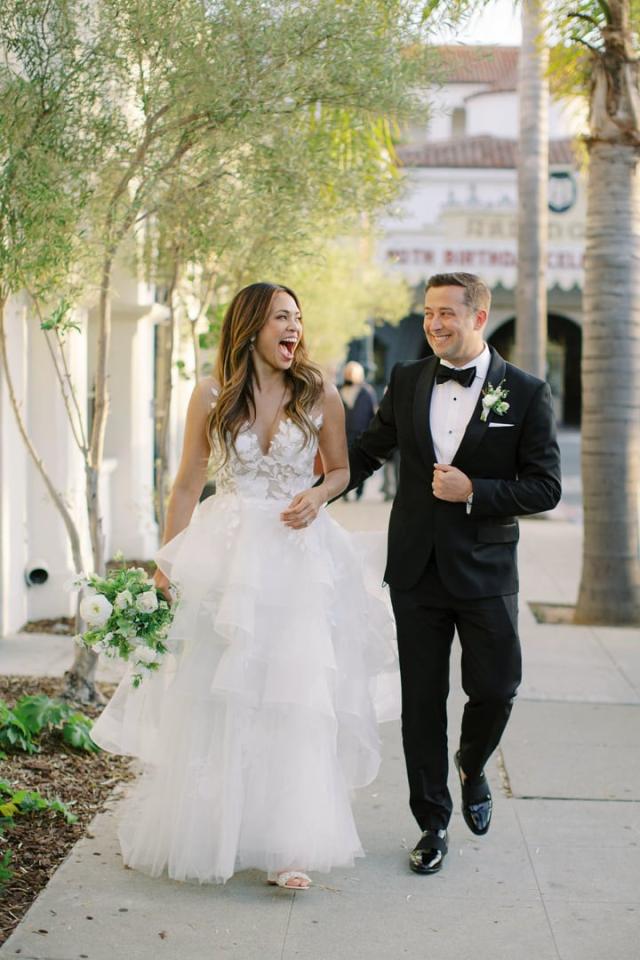 Bride & groom walking down the street for Jammie & Duncan's Wedding
