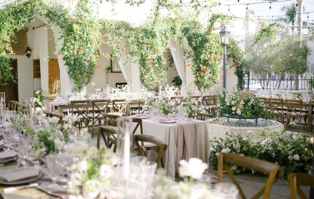 View of wedding reception with tables & flowers for Jammie & Duncan's Wedding