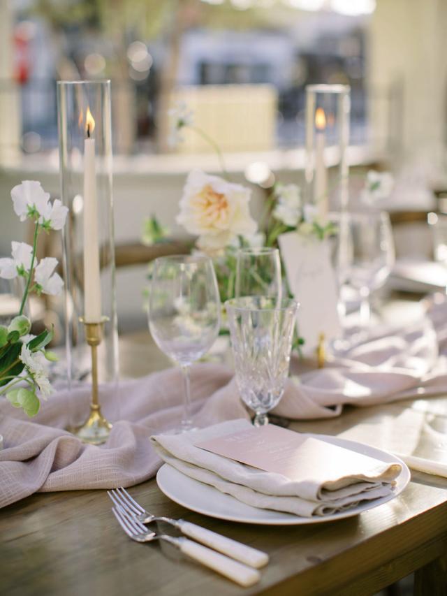 Another cross view of placemat with flowers and pink napkins for Jammie & Duncan's Wedding