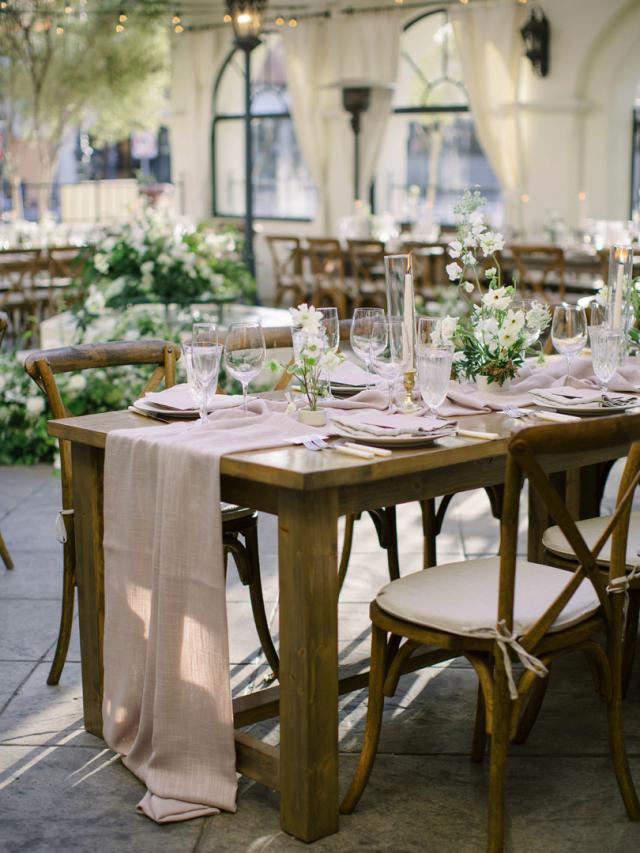Wider cross view of placemat with flowers and pink napkins for Jammie & Duncan's Wedding