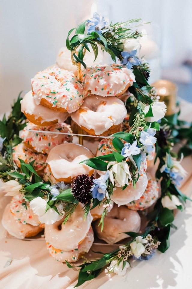 Stack of donuts with frosting and sprinkles for Jennifer & Lars' Wedding