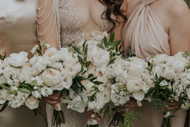 Close-up of the bride and bridesmaids' flowers for Ivanka & Victoria's wedding