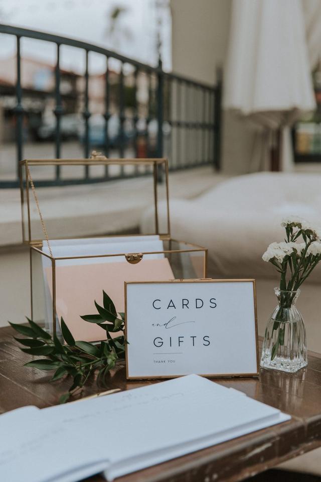 Close-up of the cards and gifts table for Ivanka & Victoria's wedding