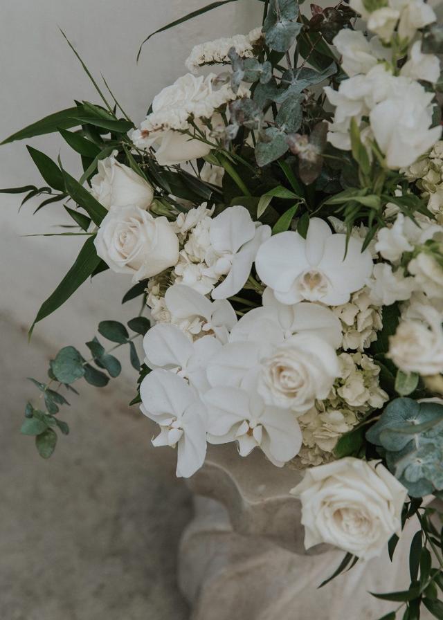 Close-up of white flowers for Ivanka and Victoria's wedding.