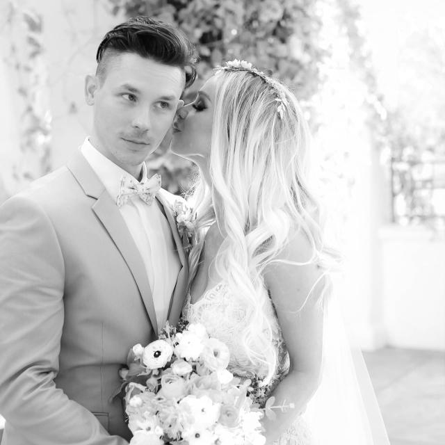 Bride Whispering to Groom at Rhiannon & Joshua's Wedding