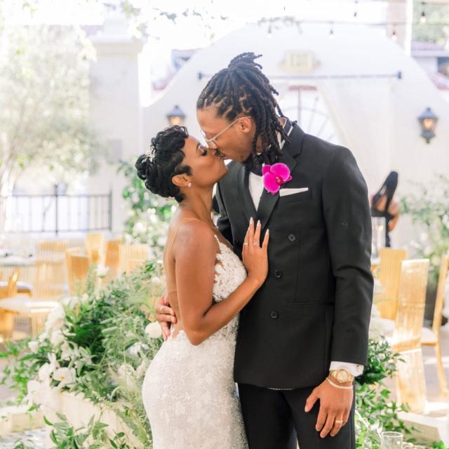 Husband and wife kissing for Daniella & Karl's Wedding